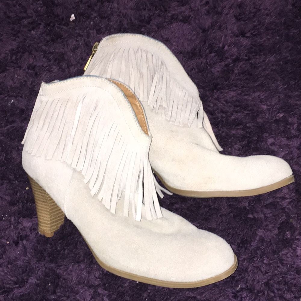 Neutral toned fringed booties 9
